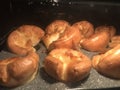 Yorkshire puddings ready to come out of the oven Royalty Free Stock Photo