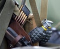 Fragmentation hand grenade and clip of rifle cartridges. Royalty Free Stock Photo