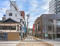 Yorozuya shopping street recognizable by its gate shaped as the Meganebashi bridge of Nakashima river. Royalty Free Stock Photo