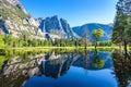 Yosemite National Park - Reflection in Merced River of Yosemite waterfalls and beautiful mountain landscape, California, USA Royalty Free Stock Photo