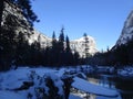 Yosemite's snow-capped mountains and pine