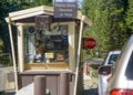 Entrance of Yosemite park with toll booth and ranger. Permit is obligatory for entrance to the park Royalty Free Stock Photo