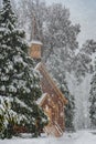 Yosemite Valley Chapel Hides Behind Snowy Pine Royalty Free Stock Photo