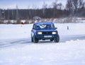 YOSHKAR-OLA, RUSSIA, JANUARY 11, 2020: Winter car show for  Christmas holidays for all comers - single and double drift, racing on Royalty Free Stock Photo