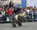 YOSHKAR-OLA, RUSSIA - MAY 5, 2018: AutoMotoshow in square. Tricks on ATV StuntRiding Wheelie, Stoppie and Akrobatyka on quad bike.