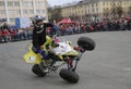 YOSHKAR-OLA, RUSSIA - MAY 5, 2018: AutoMotoshow in square. Tricks on ATV StuntRiding Wheelie, Stoppie and Akrobatyka on quad bike. Royalty Free Stock Photo