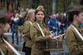 The girl drummer in the Soviet soldier`s uniform