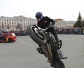 YOSHKAR-OLA, RUSSIA - MAY 5, 2018: Motoshow in the central square of the city. Tricks on a motorcycle, stuntmen, Stunt Riding