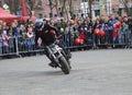 YOSHKAR-OLA, RUSSIA - MAY 5, 2018: Motoshow in the central square of the city. Tricks on a motorcycle, stuntmen, Stunt Riding