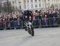 YOSHKAR-OLA, RUSSIA - MAY 5, 2018: Motoshow in the central square of the city. Tricks on a motorcycle, stuntmen, Stunt Riding