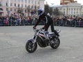 YOSHKAR-OLA, RUSSIA - MAY 5, 2018: Motoshow in the central square of the city. Tricks on a motorcycle, stuntmen, Stunt Riding