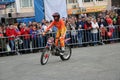 YOSHKAR-OLA, RUSSIA - MAY 5, 2018: Motoshow in the central square of the city. Tricks on a motorcycle, stuntmen, Stunt Riding