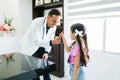 Adorable kid receiving a treat at the doctor Royalty Free Stock Photo
