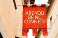 Are You Being Conned? on a conceptual image Royalty Free Stock Photo