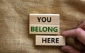 You belong here symbol. Wooden blocks with words 'You belong here'
