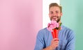 This is for you Boyfriend happy holds bouquet flowers. Man ready for romantic date bring bouquet pink flowers. Guy bring Royalty Free Stock Photo