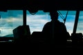 You can see the silhouette of the captain at the helm, and in the background, clouds Royalty Free Stock Photo
