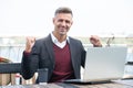 You can win. Happy businessman make winning gesture. Creating winning e-business Royalty Free Stock Photo