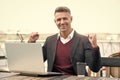 You can win. Happy businessman make winning gesture. Creating winning e-business Royalty Free Stock Photo