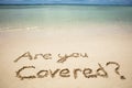 Are You Covered Question On The Beach Royalty Free Stock Photo