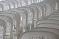 Line of White Plastic Chair