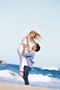 You fill my life with joy. a happy young couple enjoying a romantic day on the beach. Royalty Free Stock Photo