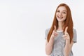 You go girl. Charming enthusiastic friendly redhead cute female student blue eyes pointing finger gun gesture smiling