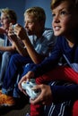 You guys ready to lose. young boys playing video games. Royalty Free Stock Photo