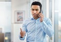 You have a deadline and need to stick to it. Shot of a young businessman looking angry while making a phone call using Royalty Free Stock Photo