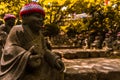 Buddah stone sculptures the path is being guarded by this Royalty Free Stock Photo