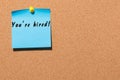 You are hired written on blue sticker pinned at notice board. Business concept with empty space for text Royalty Free Stock Photo
