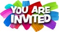 You are invited paper word sign with colorful spectrum paint brush strokes over white