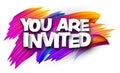 You are invited paper word sign with colorful spectrum paint brush strokes over white