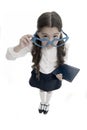 Are you kidding me. Schoolgirl heart shaped glasses isolated white background. Child girl school uniform clothes picking Royalty Free Stock Photo