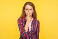 You lie! Portrait of upset ginger girl in checkered shirt pointing at nose, showing liar gesture and looking dissatisfied