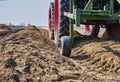 You look past a tractor at an asparagus field in Germany. Royalty Free Stock Photo