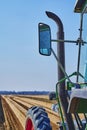 You look past a tractor at an asparagus field Royalty Free Stock Photo