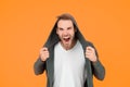 You make me angry. Angry man yellow background. Handsome guy in angry mood. Unshaven model scream with anger. Negative Royalty Free Stock Photo