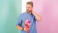 This is for you Man ready for romantic date bring bouquet pink flowers. Macho gives flowers as romantic gift. Guy bring Royalty Free Stock Photo