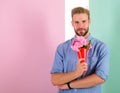 This is for you Man ready for romantic date bring bouquet pink flowers. Macho gives flowers as romantic gift. Boyfriend Royalty Free Stock Photo