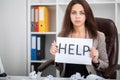 European tired and frustrated woman working as secretary in stress at work business district office desk with computer laptop ask Royalty Free Stock Photo