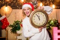 You are next. Cheerful woman.. Time to celebrate. winter holidays. Its time for christmas. xmas mood. Woman wi clock Royalty Free Stock Photo