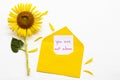 You are not alone message card handwriting in yellow envelope with yellow flower sunflower Royalty Free Stock Photo