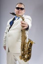 Saxophonist Caucasian soloist plays the saxophone Royalty Free Stock Photo