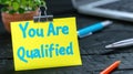 You Are Qualified Note on Clip. Generative ai. Royalty Free Stock Photo