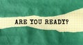 ARE YOU READY message written under green torn paper Royalty Free Stock Photo