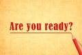 Are You ready Question Written In Yellow Paper Vintage. Red pencil interline The Message on Grungy texture paper background . Royalty Free Stock Photo