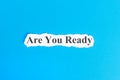 Are you ready text on paper. Word Are you ready on torn paper. Concept Image Royalty Free Stock Photo