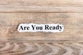 Are you ready text on paper. Word Are you ready on torn paper. Concept Image Royalty Free Stock Photo