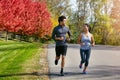 Are you ready to pick up the pace. a sporty young couple exercising together outdoors. Royalty Free Stock Photo